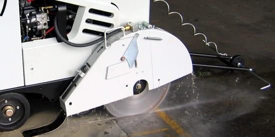 Controlled 'contraction' joints are sawn into concrete to prevent crack formation. "Contraction joints are sawn into recently laid floors by industrial floor contractors to prevent crack formation."