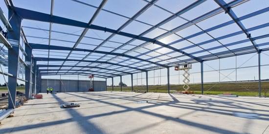 Steel portal frames offer a large unobstructed interior space. "Steel portal frames offer a large unobstructed interior space."