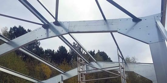 Portal frames are bolted or welded to form a frame structure. "Portal frames are bolted or welded to form a frame structure."